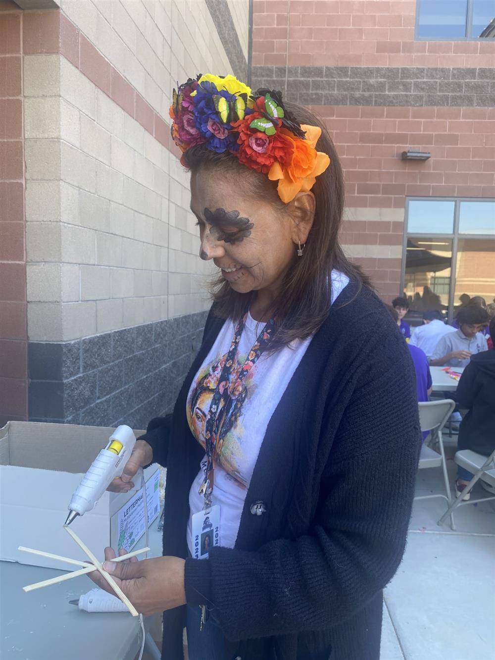 Senorita Spada helping the students make kites